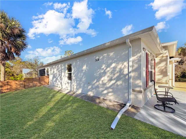 a view of backyard with a tv