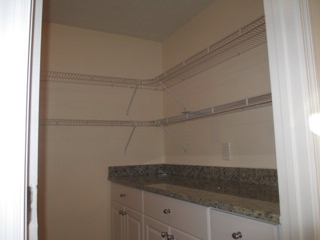6940 Columbus Road Lizella, GA 31052 - Photo 4 of 14 a bathroom with a shower and vanity