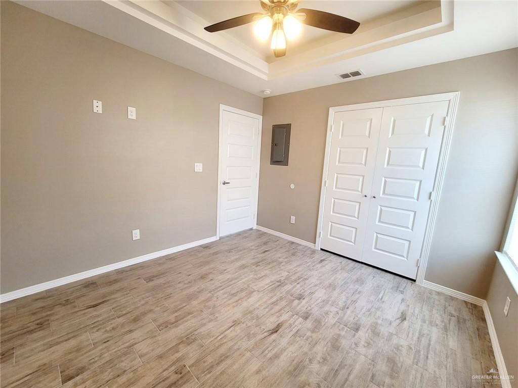 3808 Las Vistas Lane, Unit 1 Weslaco, TX 78596 - Photo 14 of 20 a view of an empty room with a window