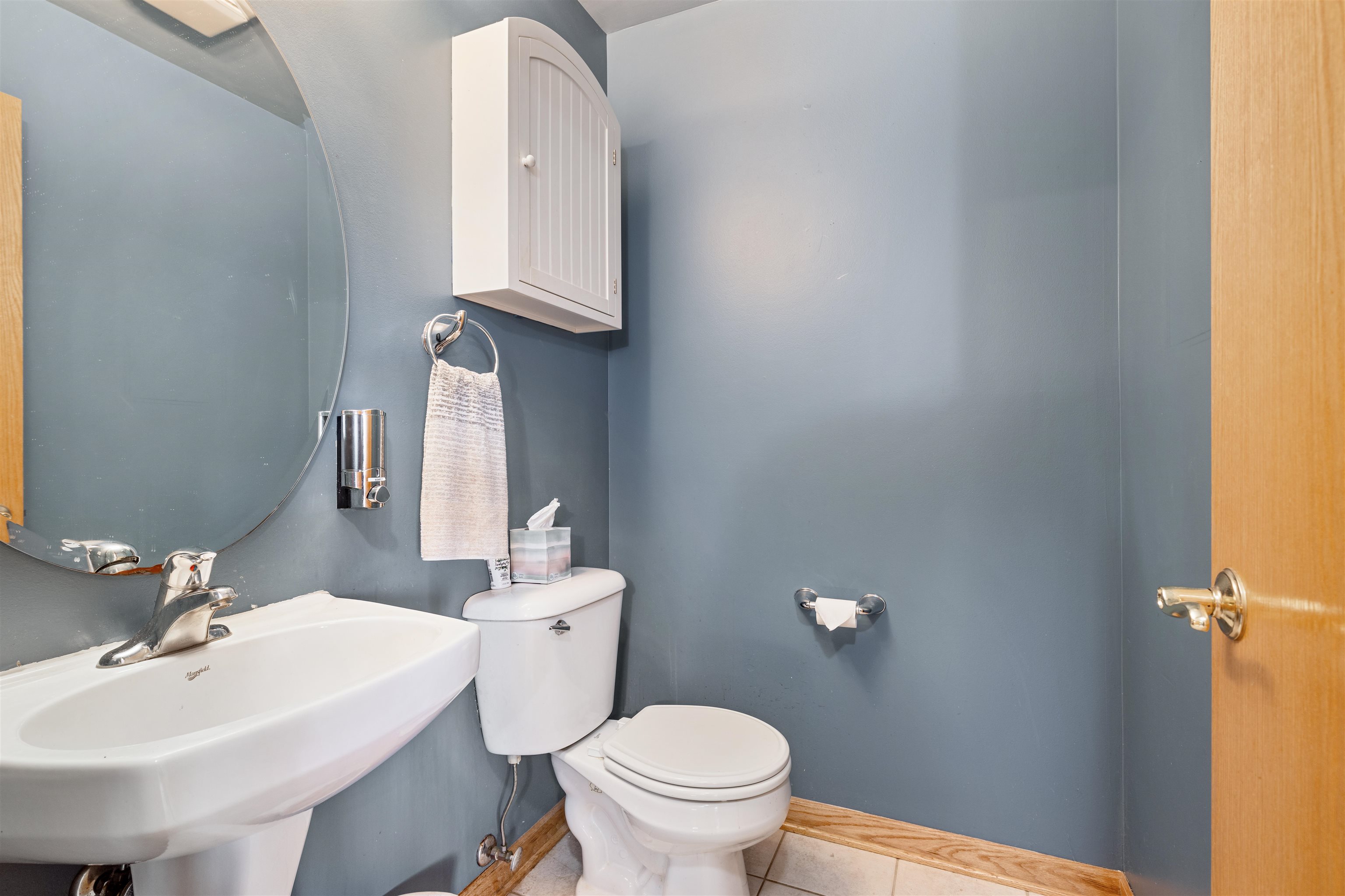 8609 South Rood Road Kingston, IL 60145 - Photo 12 of 39 a bathroom with a toilet sink and mirror