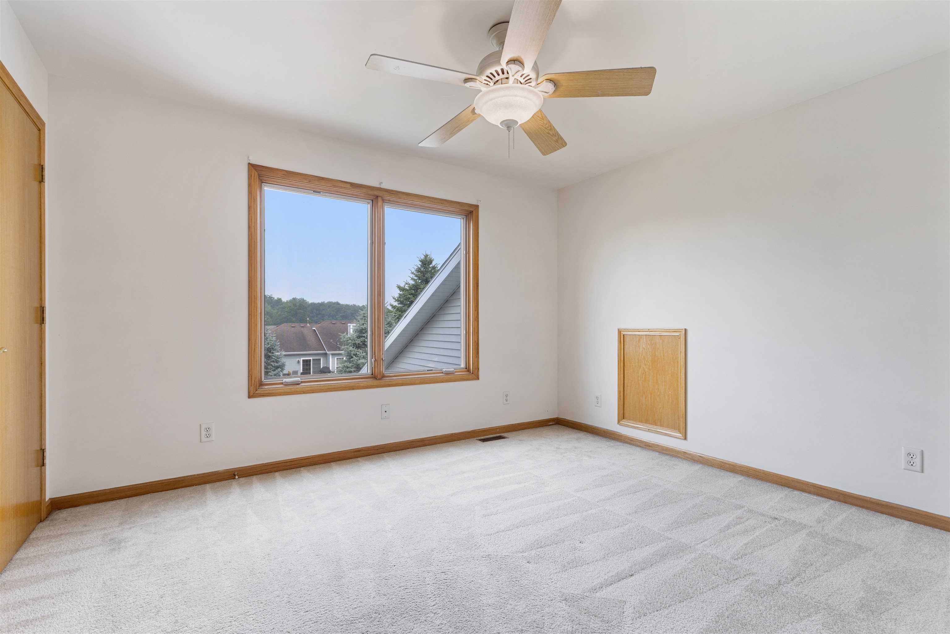 8609 South Rood Road Kingston, IL 60145 - Photo 16 of 39 an empty room with windows and fan