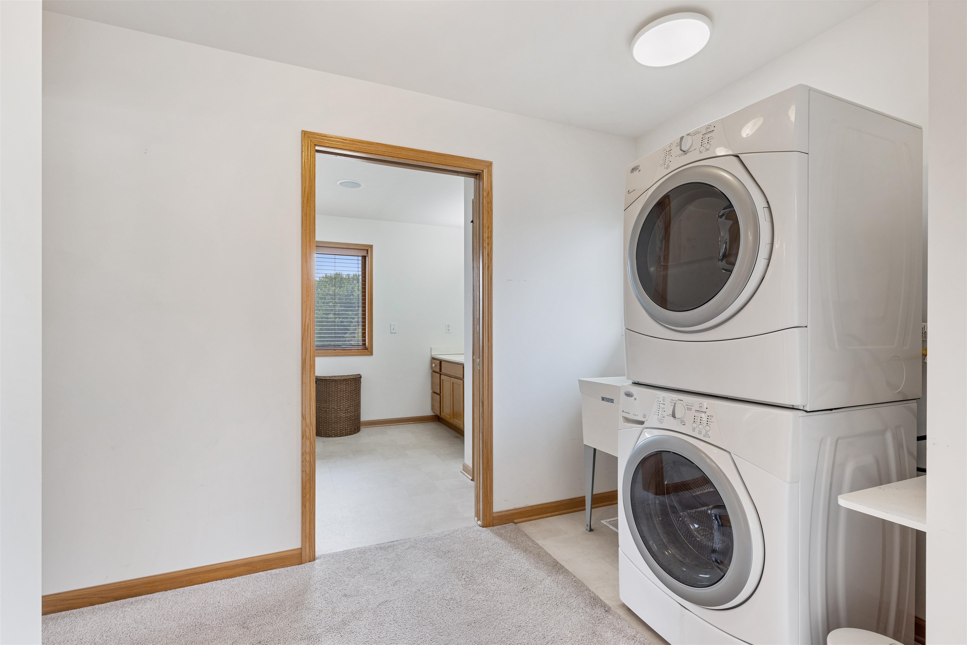 8609 South Rood Road Kingston, IL 60145 - Photo 25 of 39 a view of a hallway with washer and dryer