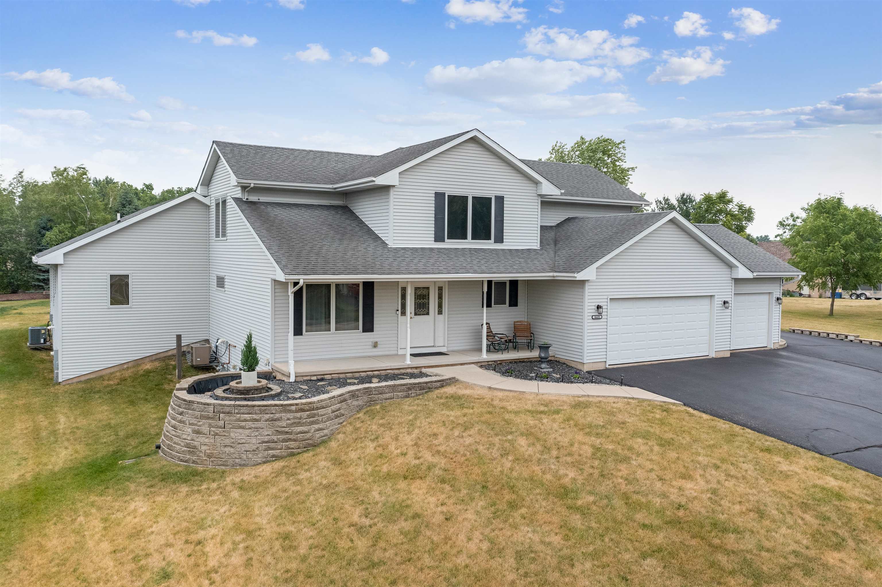 8609 South Rood Road Kingston, IL 60145 - Photo 3 of 39 a house view with a garden space