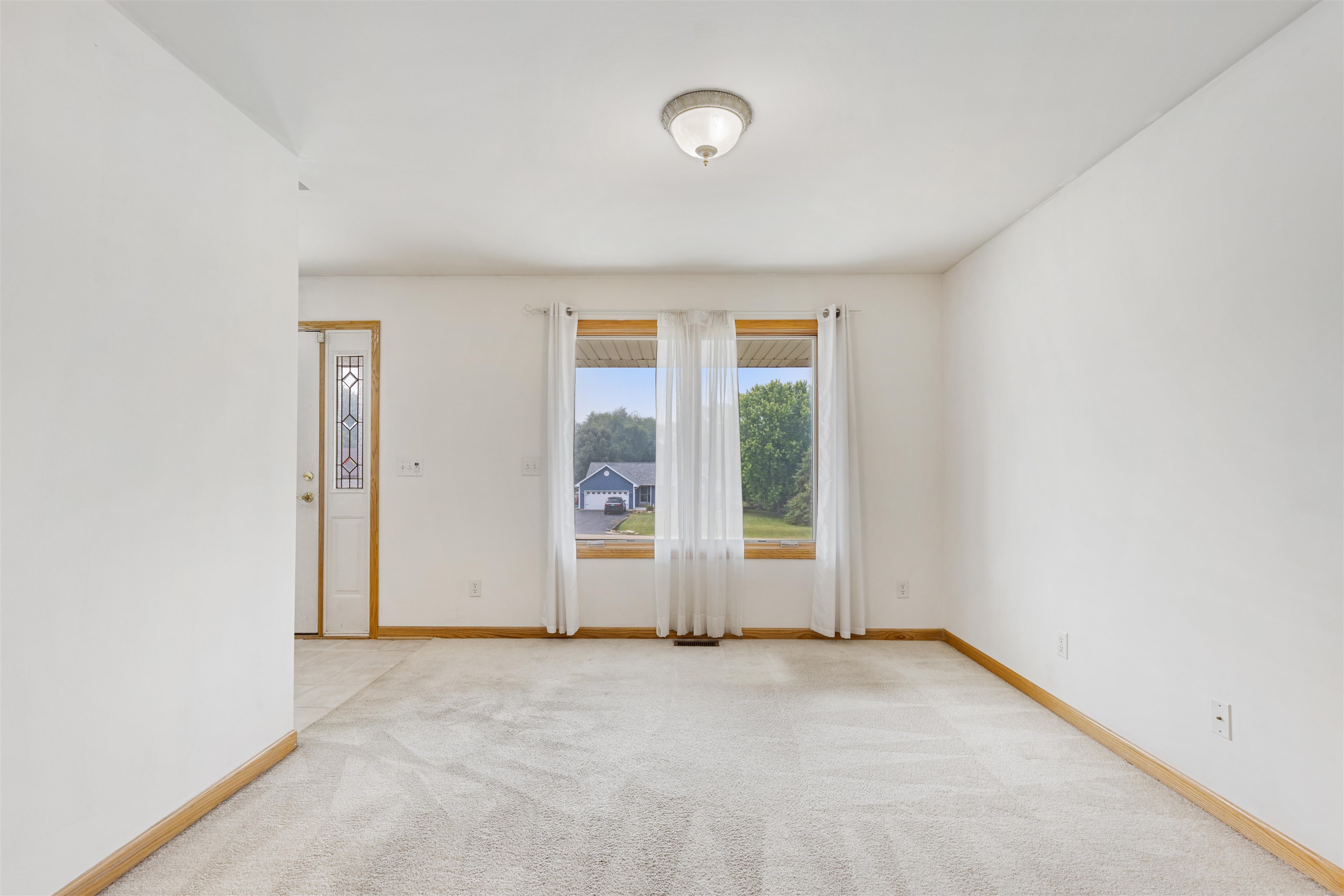 8609 South Rood Road Kingston, IL 60145 - Photo 4 of 39 an empty room with windows