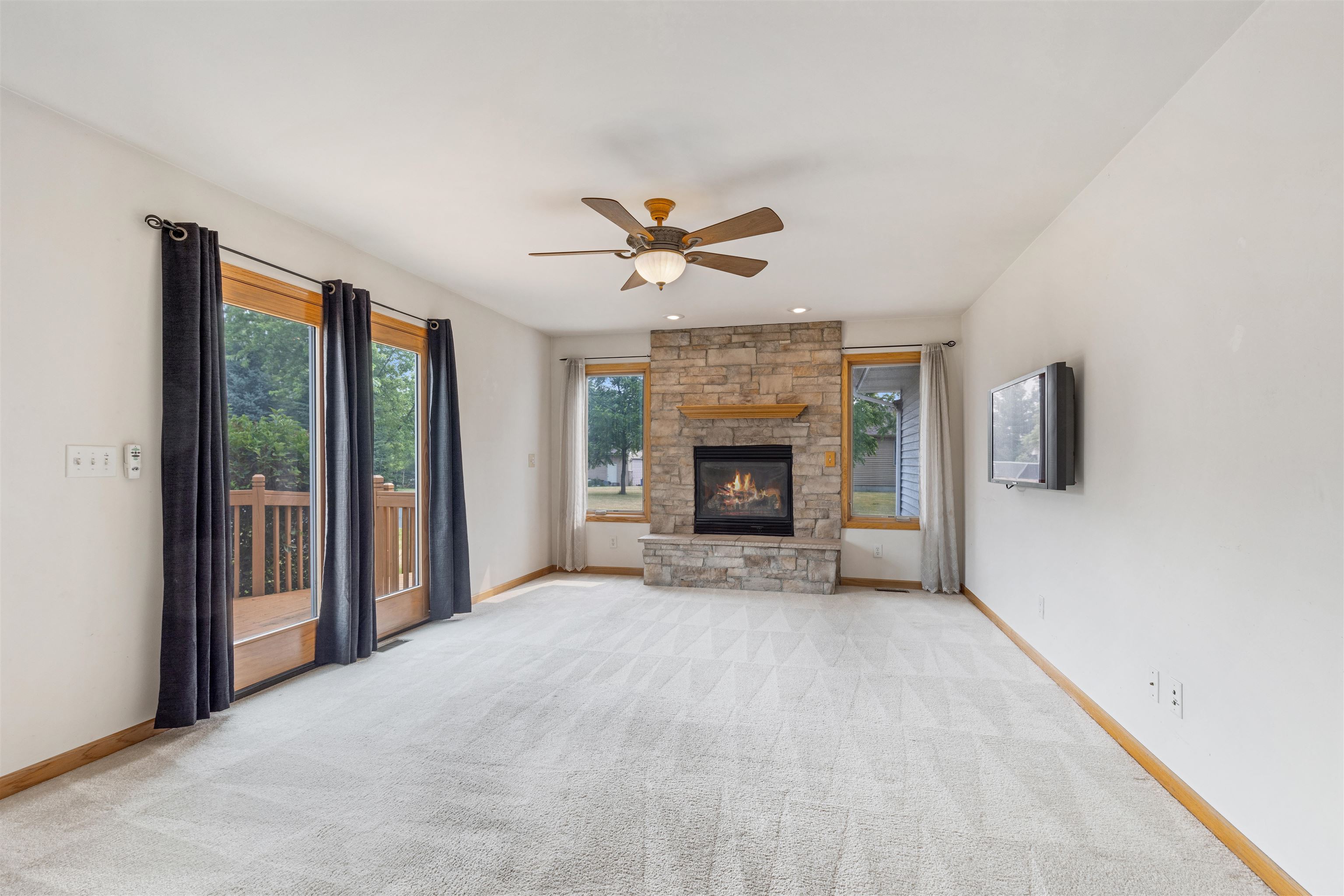 8609 South Rood Road Kingston, IL 60145 - Photo 5 of 39 a view of an empty room with a fireplace