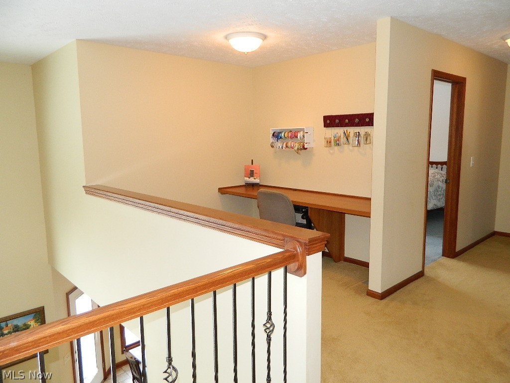 12395 Falcon Ridge Road Chesterland, OH 44026 - Photo 19 of 35 As You Walk Upstairs, You Are Greeted with this Study/Crafting Station