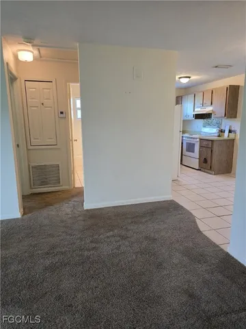 a view of a kitchen with a sink