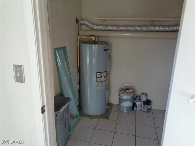 a view of a storage & utility room with closet