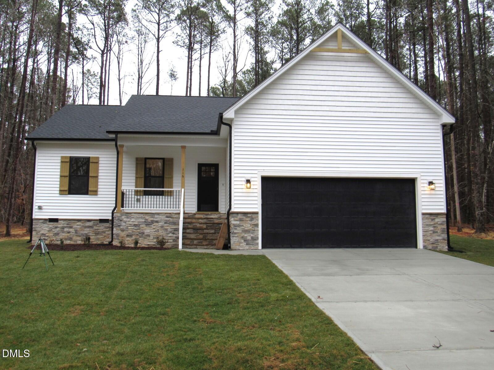 116 Beaver Trail Littleton, NC 27850 - Photo 1 of 47 a front view of a house with a yard