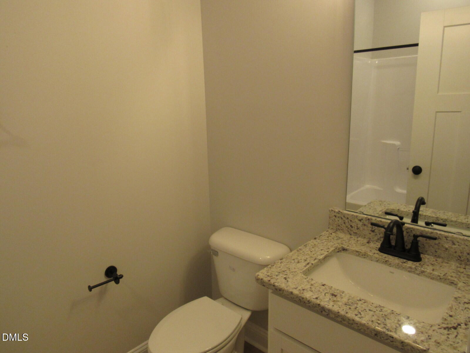 116 Beaver Trail Littleton, NC 27850 - Photo 22 of 47 a bathroom with a granite countertop sink toilet and mirror