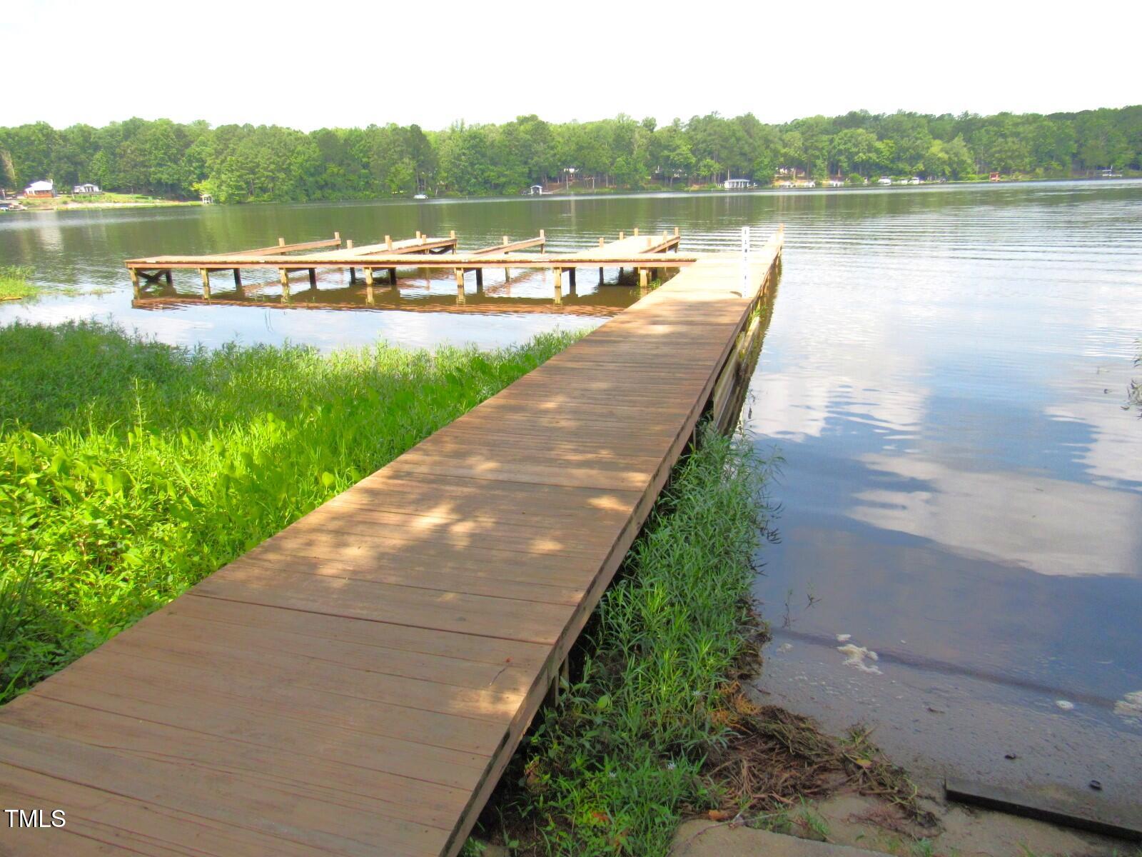 116 Beaver Trail Littleton, NC 27850 - Photo 41 of 47 a view of a lake with houses with outdoor space