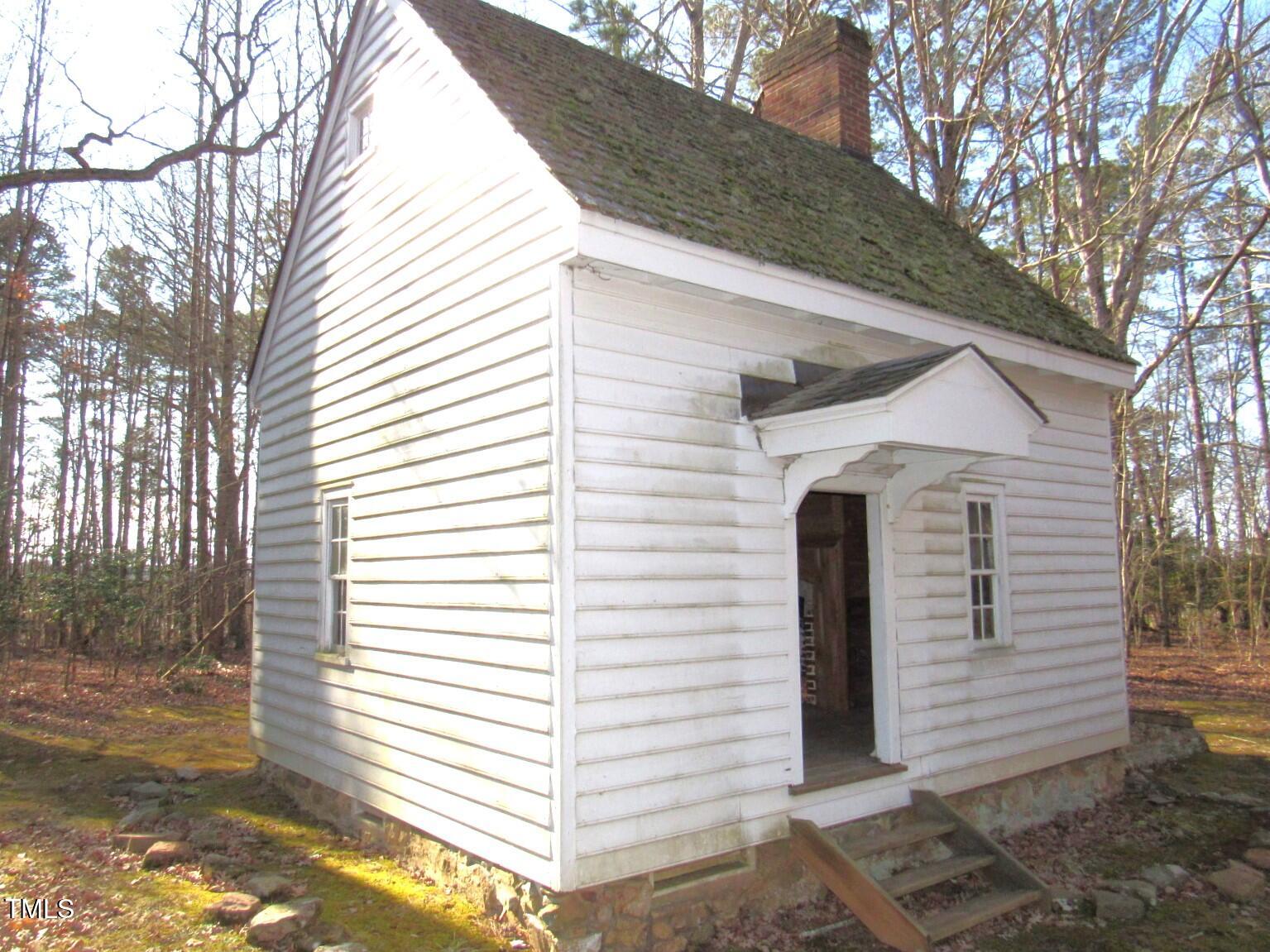 116 Beaver Trail Littleton, NC 27850 - Photo 45 of 47 a view of a white house with a large trees