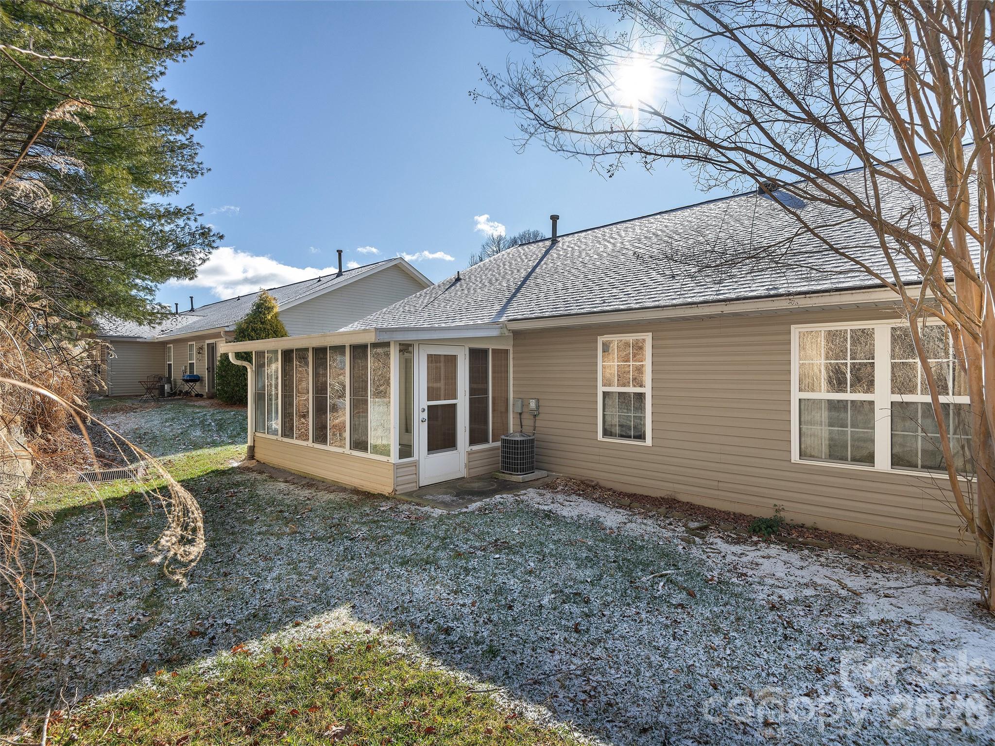 88 Wiltshire Circle Fletcher, NC 28732 - Photo 16 of 16 a view of a house with a yard