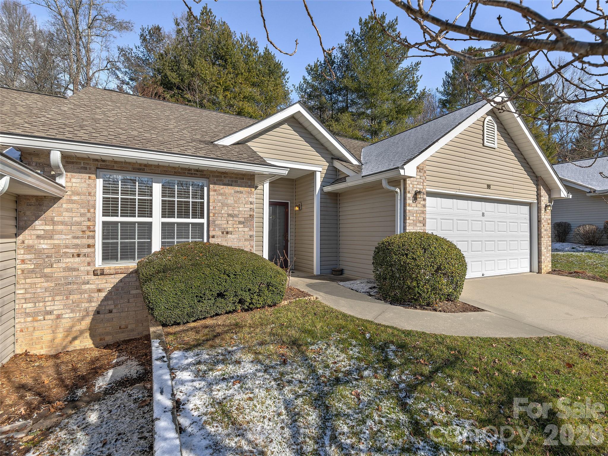 88 Wiltshire Circle Fletcher, NC 28732 - Photo 2 of 16 a view of a house with a yard and large tree