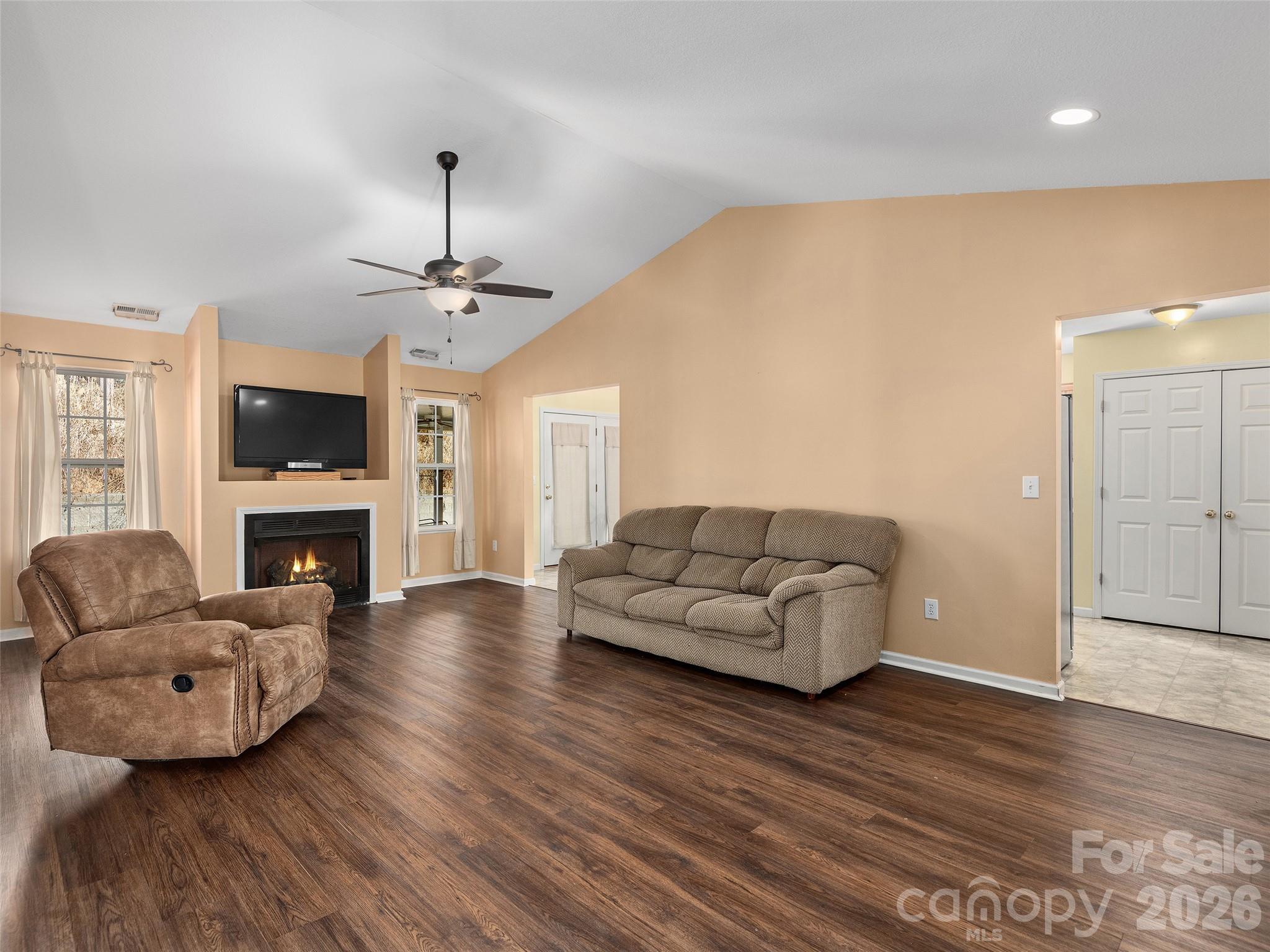 88 Wiltshire Circle Fletcher, NC 28732 - Photo 3 of 16 a living room with furniture and a fireplace