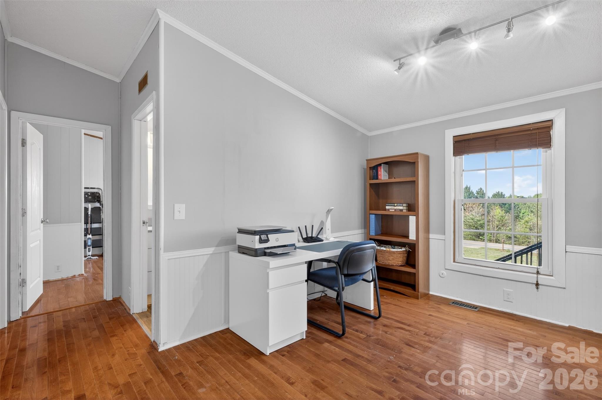4352 Anderson Mountain Road Maiden, NC 28650 - Photo 25 of 42 a view of a workspace with furniture and a window