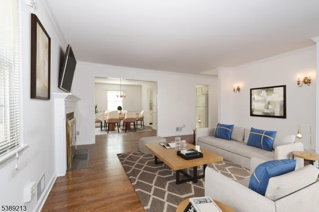 a living room with furniture and a table