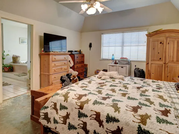 a view of a workspace with furniture and toys