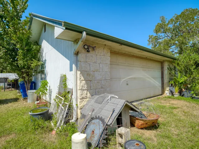 a view of a lake with houses in the background