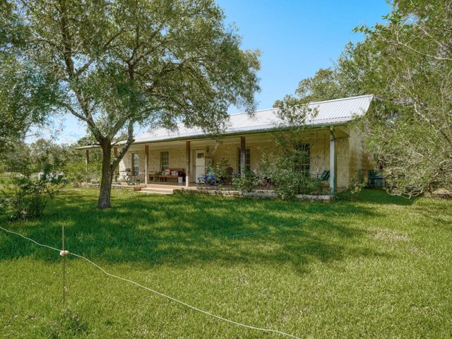 a view of a building with a patio