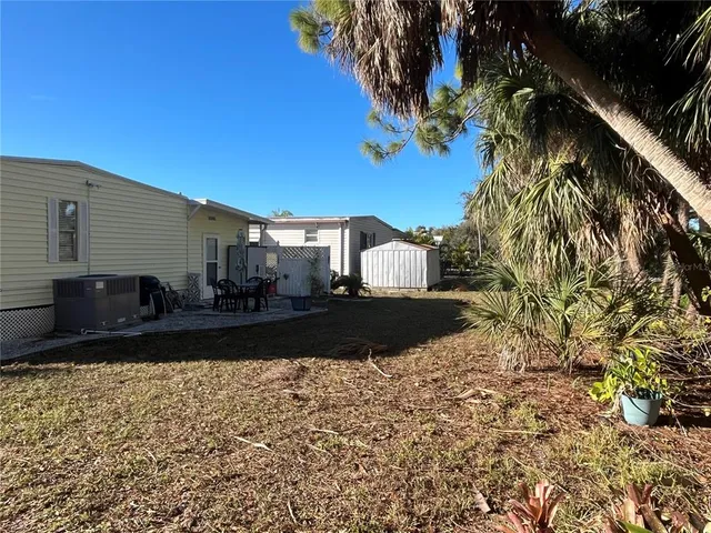 a view of a back yard of the house