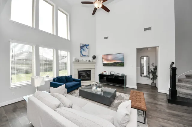 a view of a dining room and kitchen with a table chairs