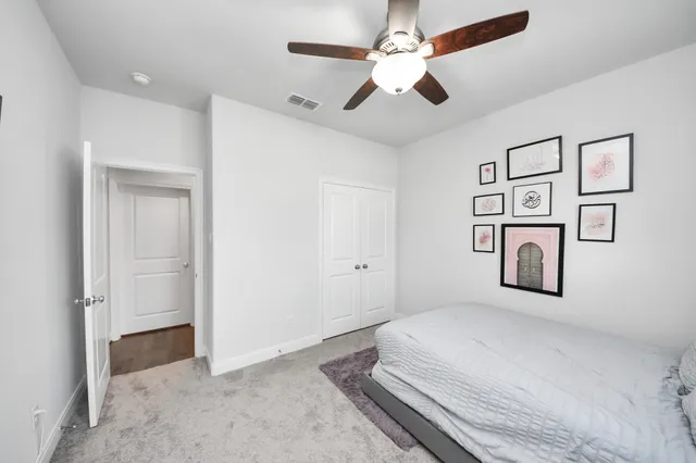 a bathroom with a sink vanity granite toilet tub and shower