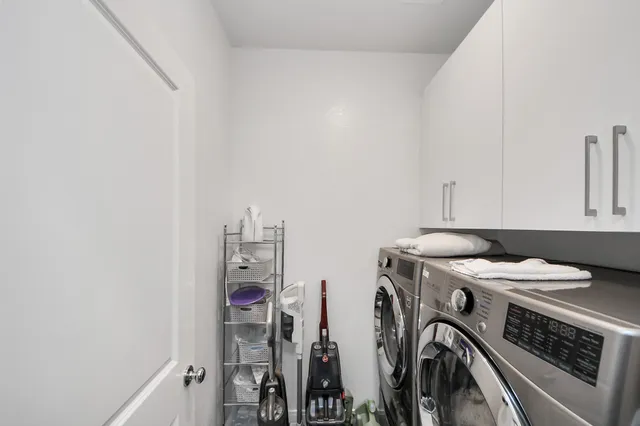 a workspace with furniture and a flat screen tv