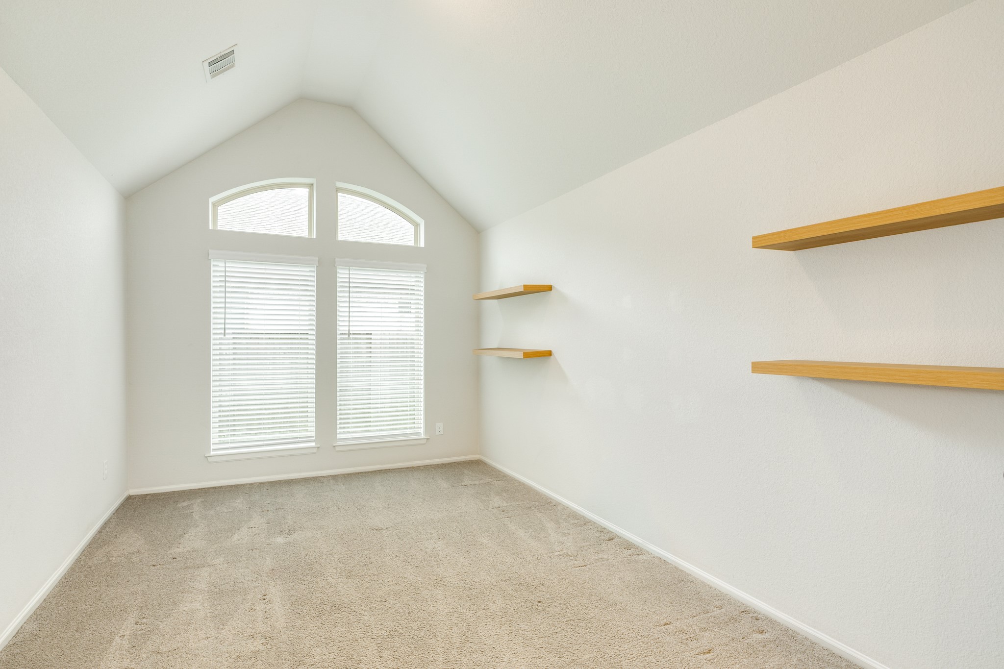 10115 Stride Court Rosharon, TX 77583 - Photo 6 of 40 Bright and inviting office space featuring floor-to-ceiling windows that fill the room with abundant natural light, creating an ideal and productive work-from-home environment.