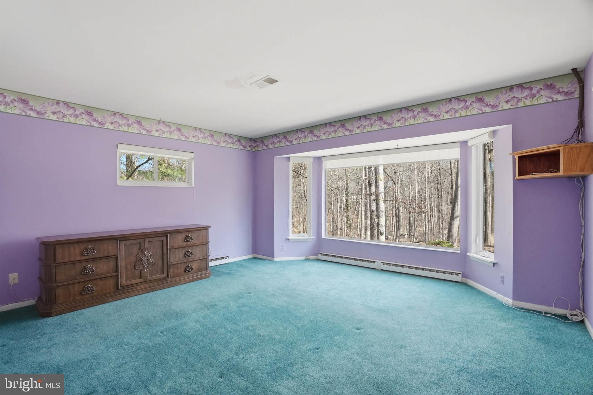 14917 Claude Lane Silver Spring, MD 20905 - Photo 21 of 52 a view of an empty room with a window