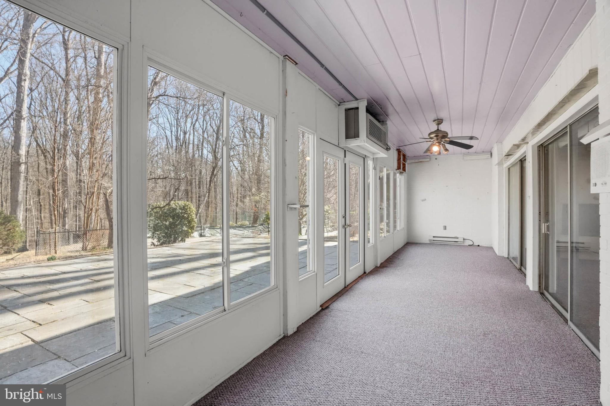 14917 Claude Lane Silver Spring, MD 20905 - Photo 40 of 52 a view of a porch with a floor to ceiling window