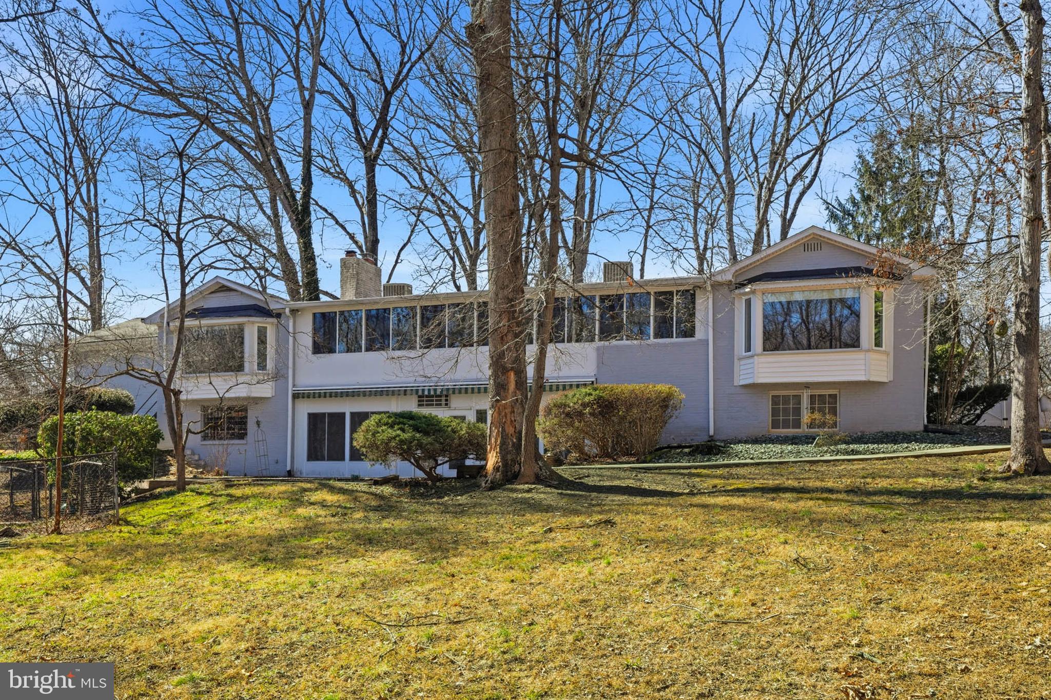 14917 Claude Lane Silver Spring, MD 20905 - Photo 46 of 52 a front view of a building with swimming pool