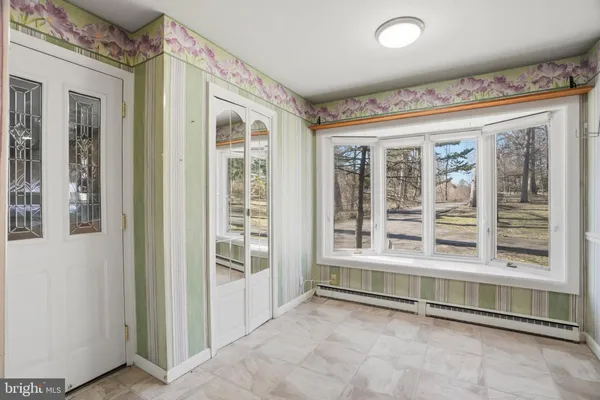 a view of an entryway with a window