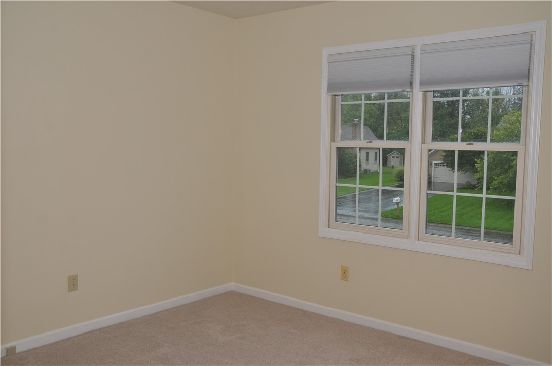 1092 Wickerton Lane Webster, NY 14580 - Photo 19 of 38 Bedroom #2's front-facing windows