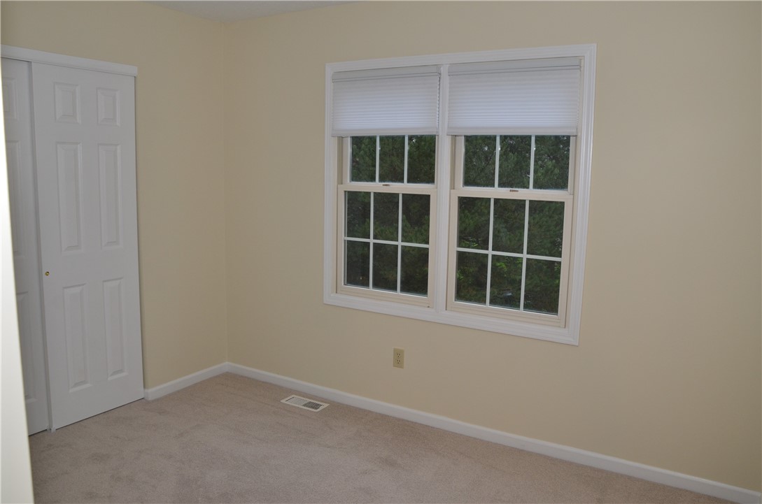1092 Wickerton Lane Webster, NY 14580 - Photo 21 of 38 Bedroom #3's rear-facing windows