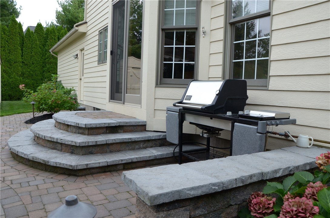 1092 Wickerton Lane Webster, NY 14580 - Photo 25 of 38 Steps from patio into kitchen. Natural gas line.