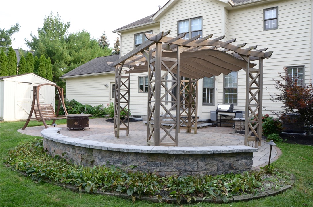 1092 Wickerton Lane Webster, NY 14580 - Photo 27 of 38 View of sitting wall and pergola