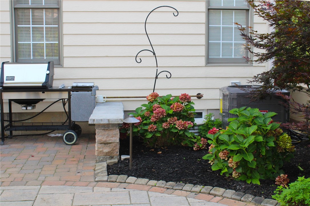 1092 Wickerton Lane Webster, NY 14580 - Photo 32 of 38 Beautifully landscaped garden bed.