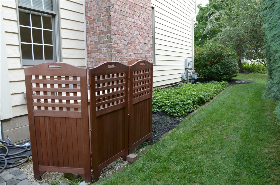 1092 Wickerton Lane Webster, NY 14580 - Photo 33 of 38 Landscaping along west side of house.