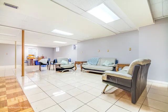 a living room with furniture and a table