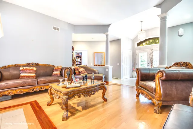 a living room with furniture and a couch