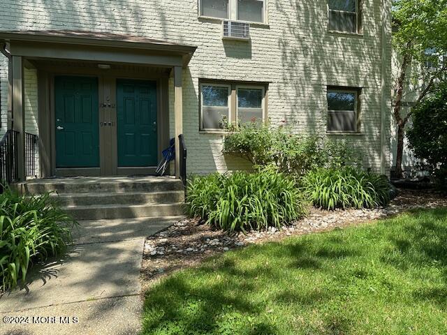 440 Cross Road, Unit C11 Matawan, NJ 07747 - Photo 6 of 6 a view of a house with a yard