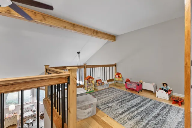 a bed room with a bed and a baby crib