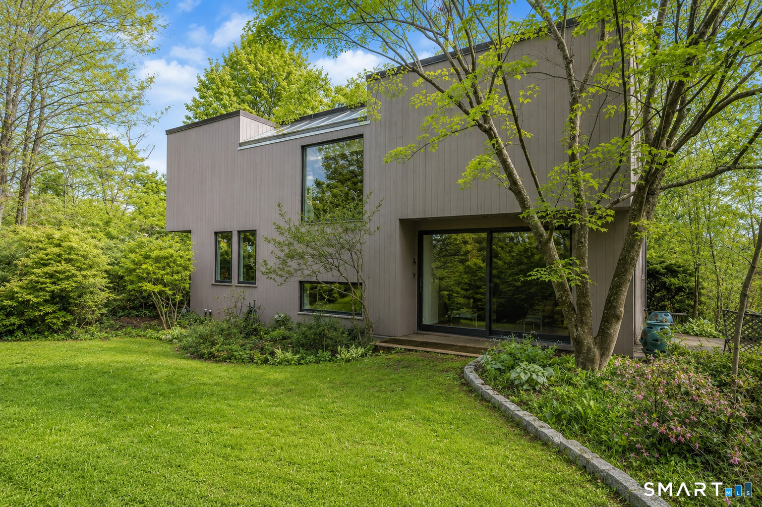 370 R Maiden Lane Durham, CT 06422 - Photo 4 of 28 A one-of-a-kind contemporary retreat tucked into a storybook setting