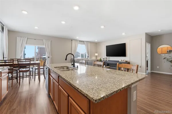 a kitchen with sink a counter top space and appliances
