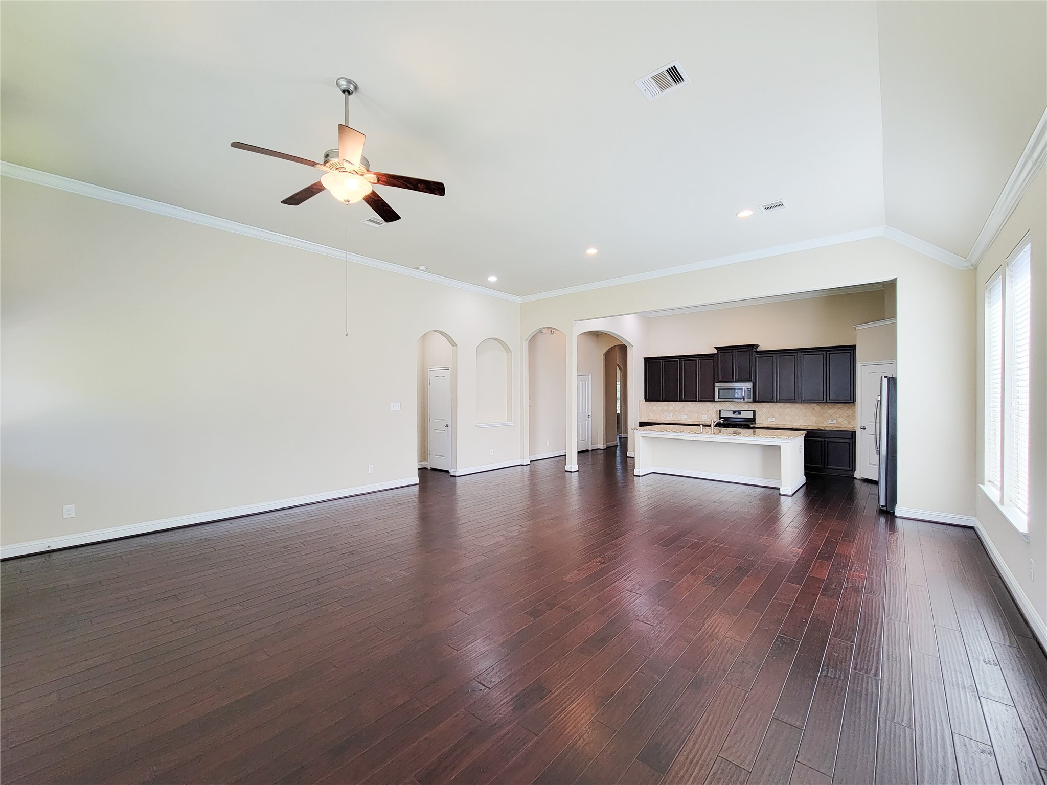 4102 Astoria Manor Lane Fulshear, TX 77441 - Photo 11 of 42 a view of kitchen with furniture and wooden floor