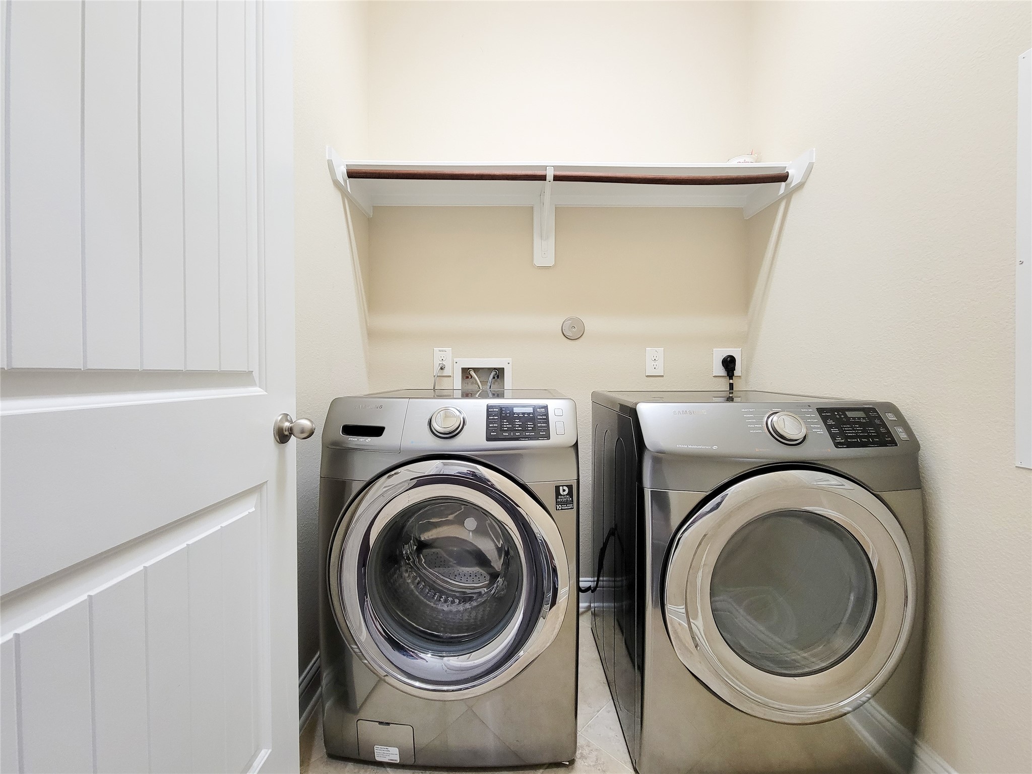 4102 Astoria Manor Lane Fulshear, TX 77441 - Photo 41 of 42 a utility room with dryer and washer