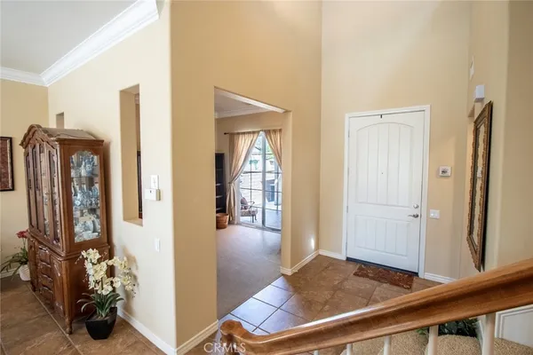 a view of a workspace with furniture and a workspace