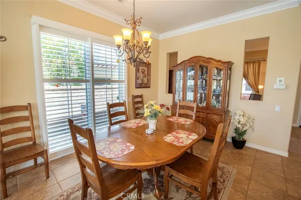 a living room with furniture window and a fireplace