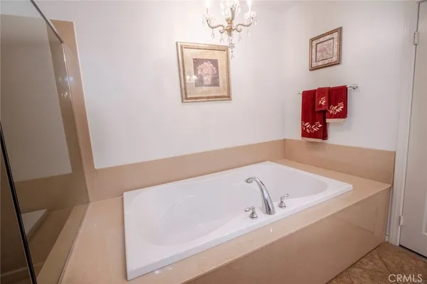 a room with table chair and a window